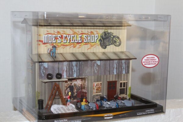 Menarnds #275-9251 O-1:48 Scale Moe's Cycle Shop With 4.5-volt power supply
